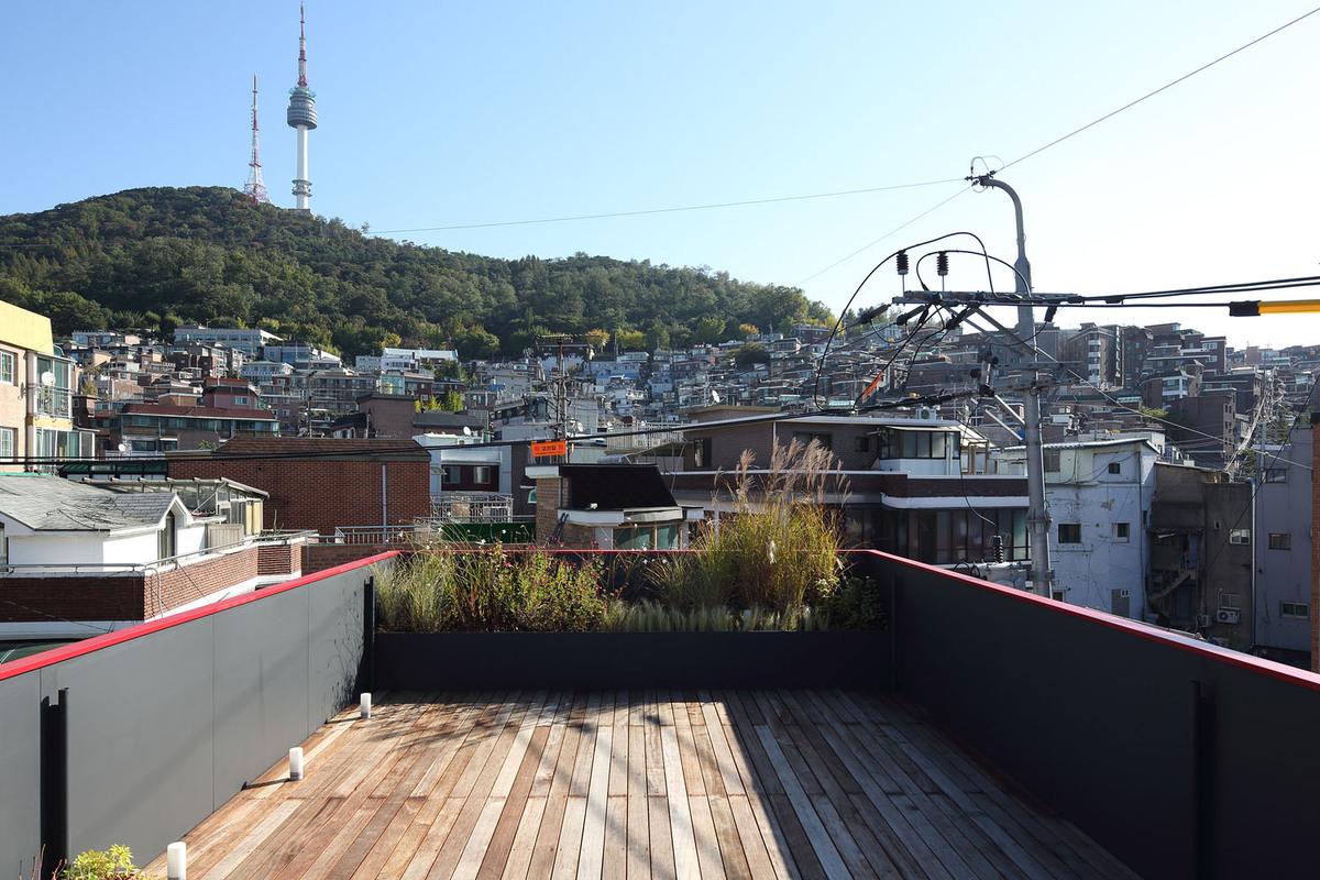 微型宇宙：生活与工作交汇的多层次“建筑”系统