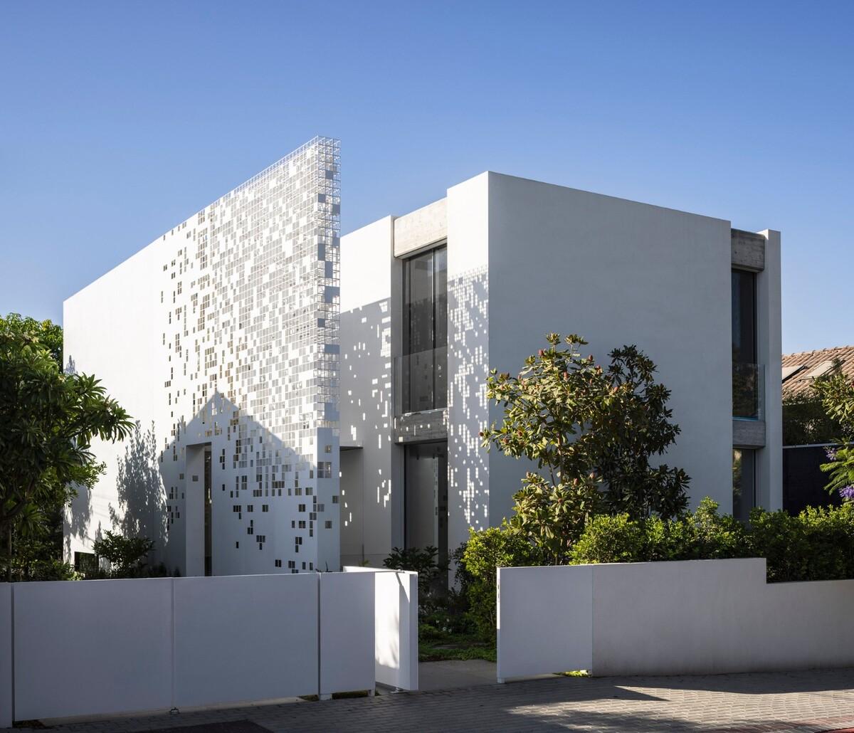一堵“逐渐消失”的墙，溶解像素屋 / Anderman Architects