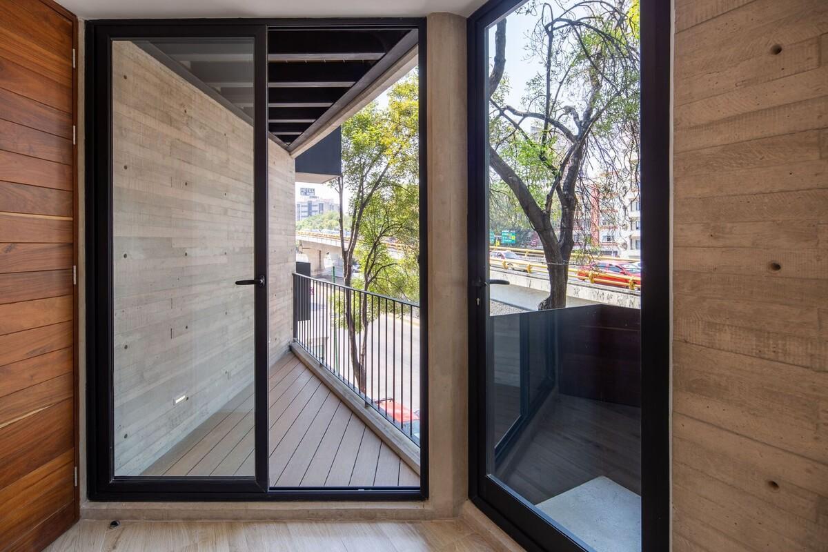 三角形住宅楼：MO288 住宅楼 / HGR ARQUITECTOS