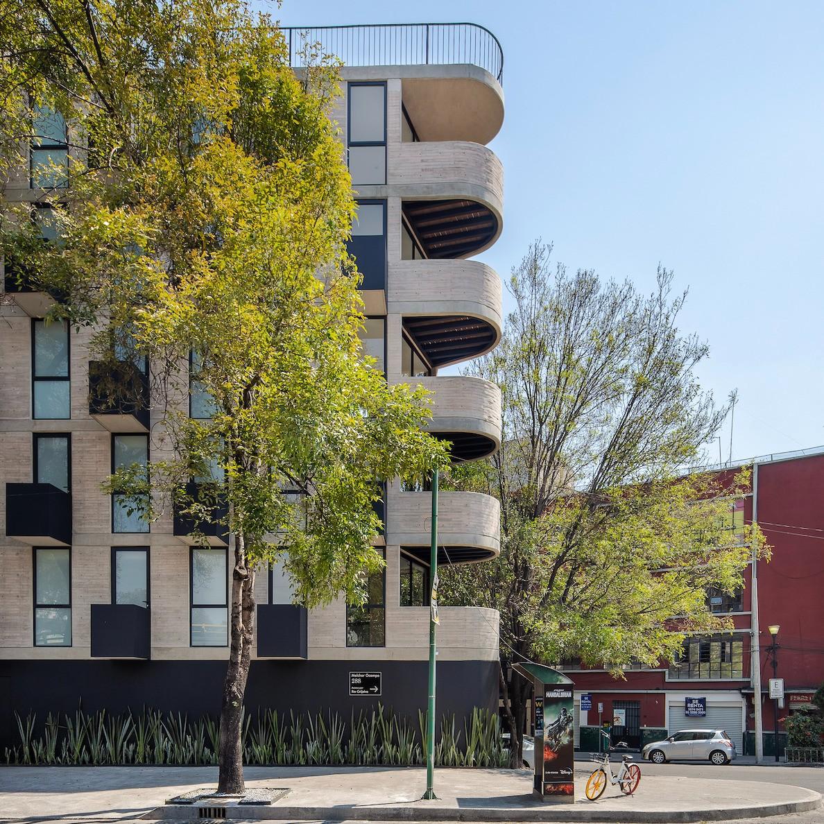 三角形住宅楼：MO288 住宅楼 / HGR ARQUITECTOS