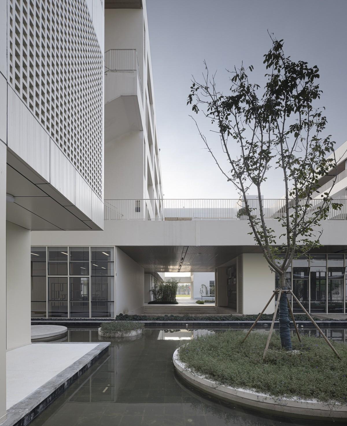 苏州大学高邮实验学校 / 九城都市建筑